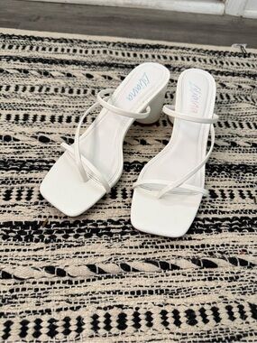 White kitten heels